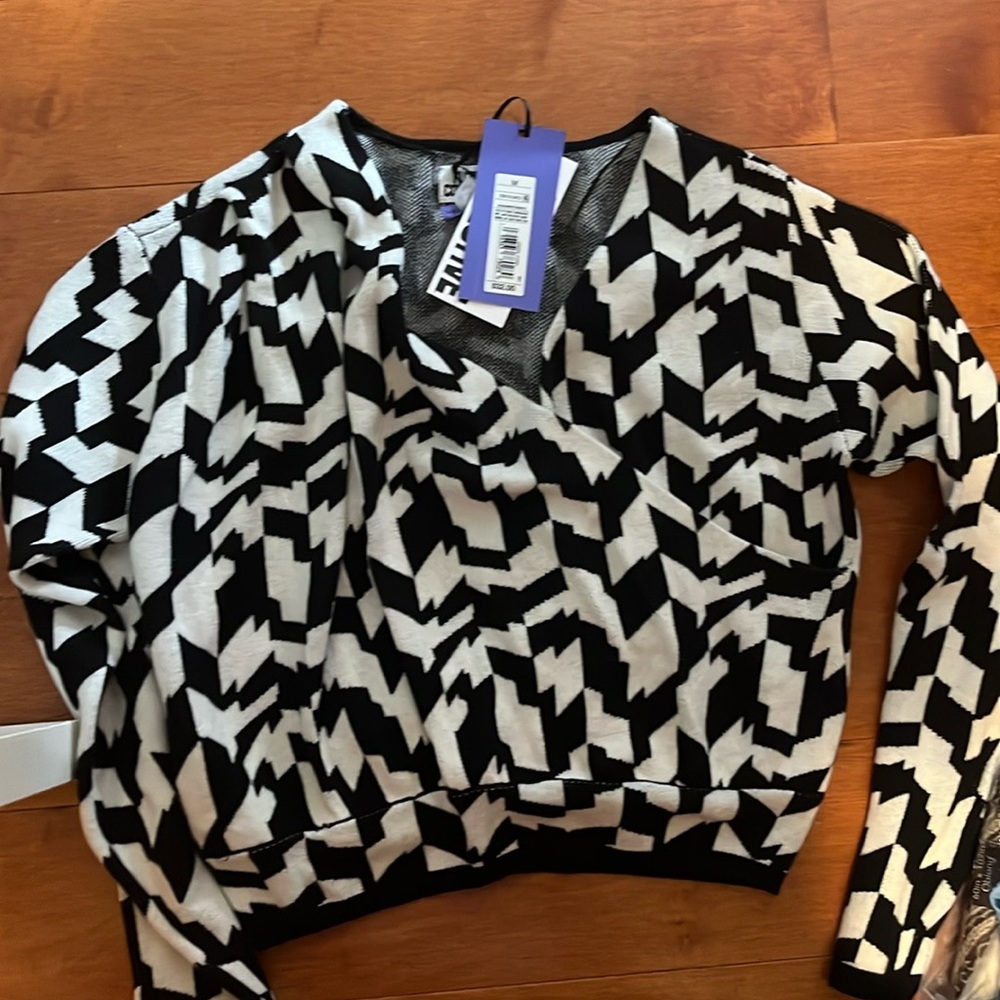 V neck sweater - mid drift showing